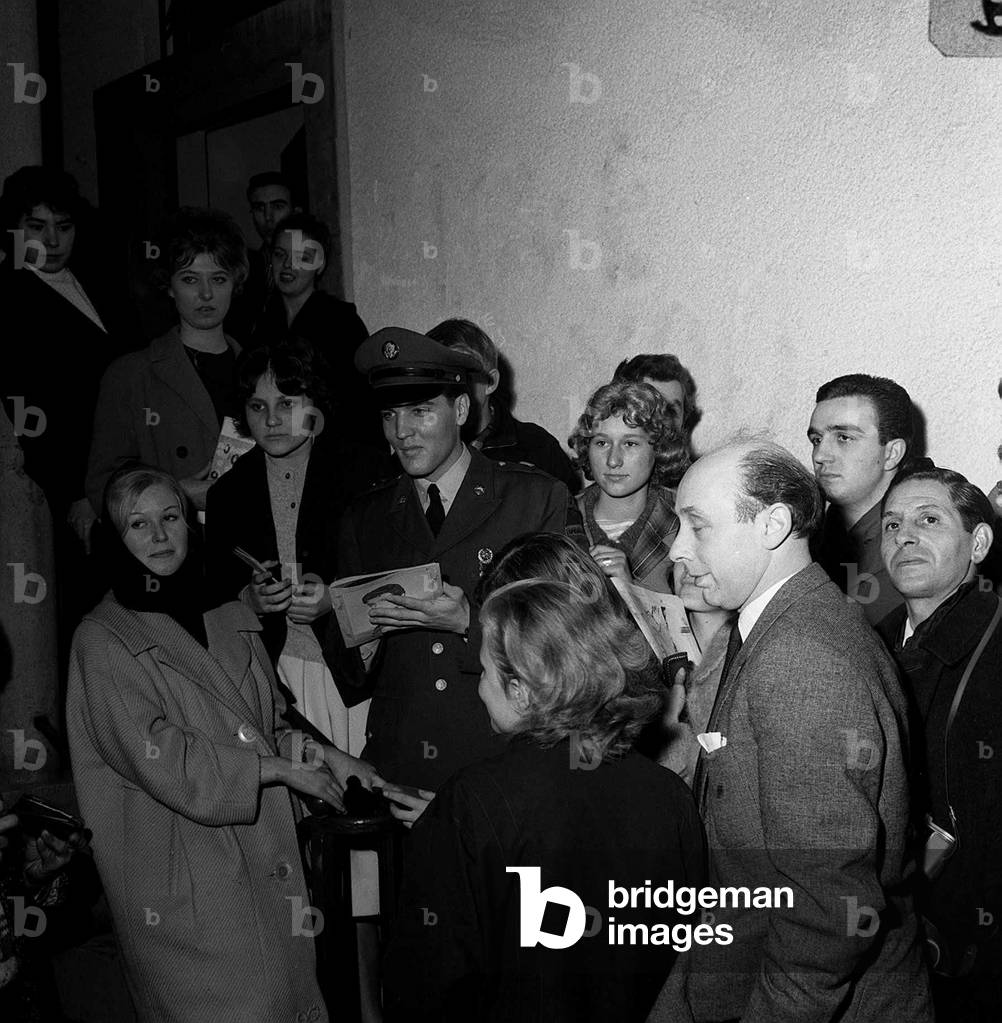 Elvis Presley with fans, Germany, 1960 (b/w photo)