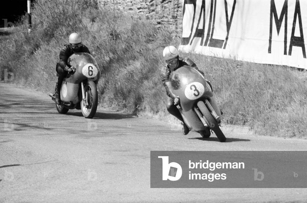 Junior International 350cc race, Isle of Man. Mike Hailwood (3) and Gary Hocking during the race, 4th June 1964 (b/w photo)
