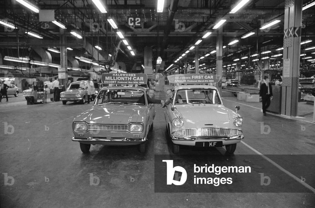 The millionth car produced at the Halewood plant of the Ford Motor Company marked two milestones. An important change in management, as the Operations Manager Stan Cross leaves for promotion & Charles Skinner takes over, and the 1,000,000th car produced was presented to charity 30th May 1969 (b/w photo)