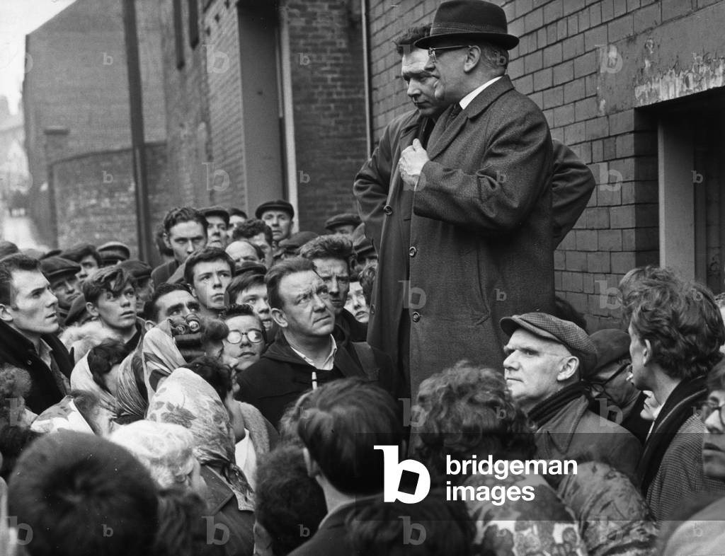 James Dempsey MP, Member of Parliament for Coatbridge and Airdrie from 1959 until he died in office in 1982, pictured speaking to workers at a gathering February 1966 (b/w photo)