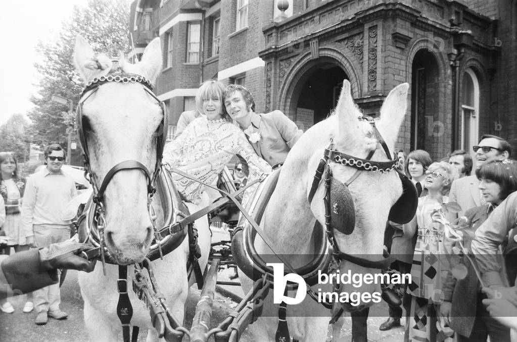 DJ Kenny Everett, pictured on his wedding day to secretary Lee Middleton at Kensington Registry Office, London, Monday 2nd June 1969 (b/w photo)