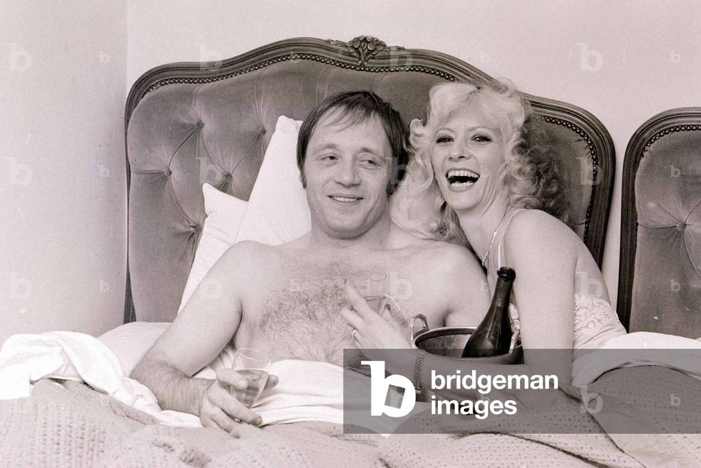 John Bindon actor with girlfriend Vicki Hodge celebrating after winning his court case at the Old Bailey, 1979
