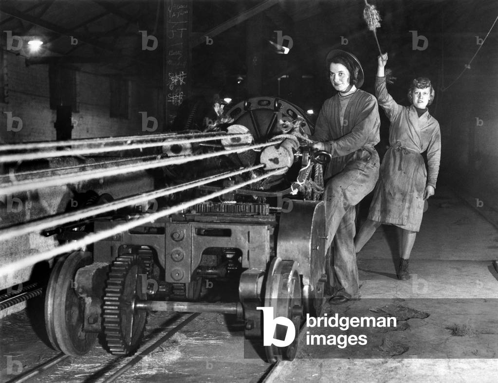 Rope making: Off to another hawser. The signals is given and the rope begins to turn as it makes it's way along the rope walk railway. January 1944