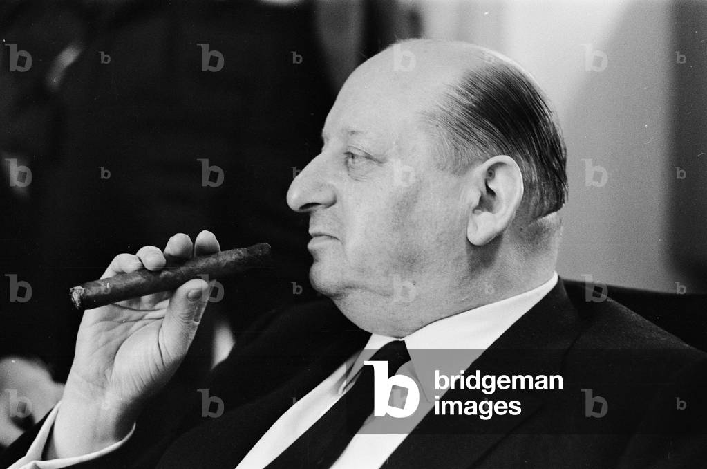 Media Mogul Lord Lew Grade smoking a cigar. 24th January 1967 (b/w photo)