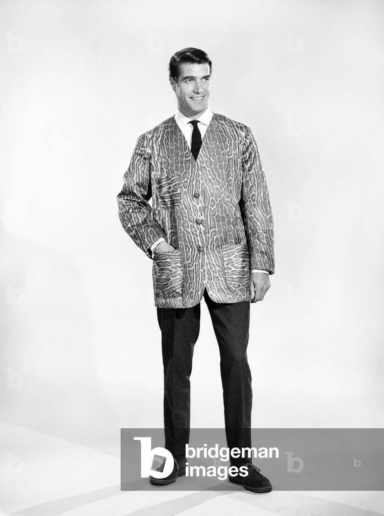 Clothing: Fashion: Menswear: Man (Peter Christian) seen here wearing leopard print jacket. 1966 (b/w photo)