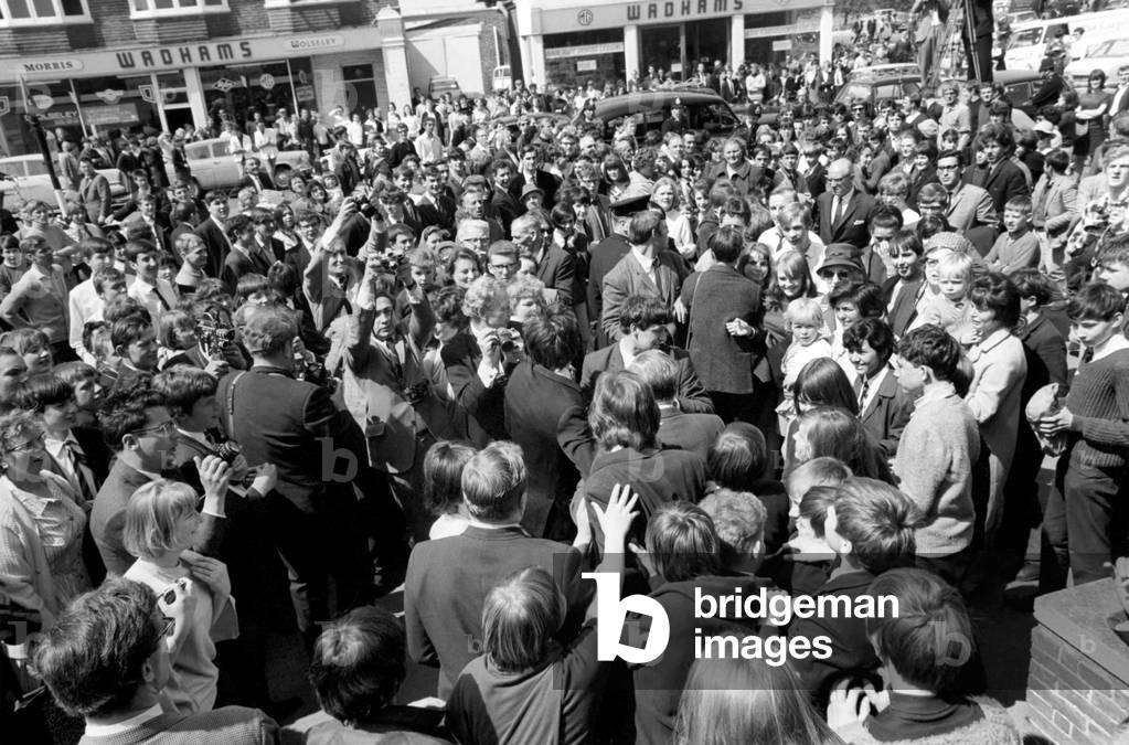 Crowds wait to see Mick Jagger and Keith Richards. Rolling Stones in Court on Drug Charges. Mick Jagger and Keith Richards are mobbed by a huge crowd as they leave court during the lunch break today. May 1967