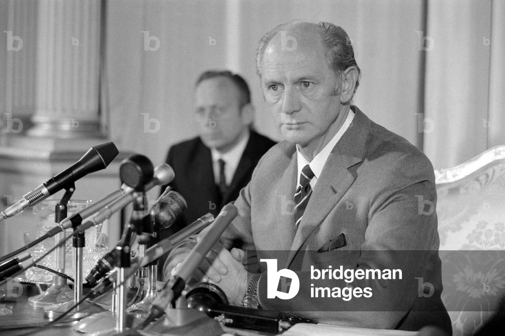 Prime minister of the Republic of Ireland Jack Lynch answers questions at the Irish Embassy in London during a press conference following his two day meeting with Edward Heath, 28th September 1971 (b/w photo)