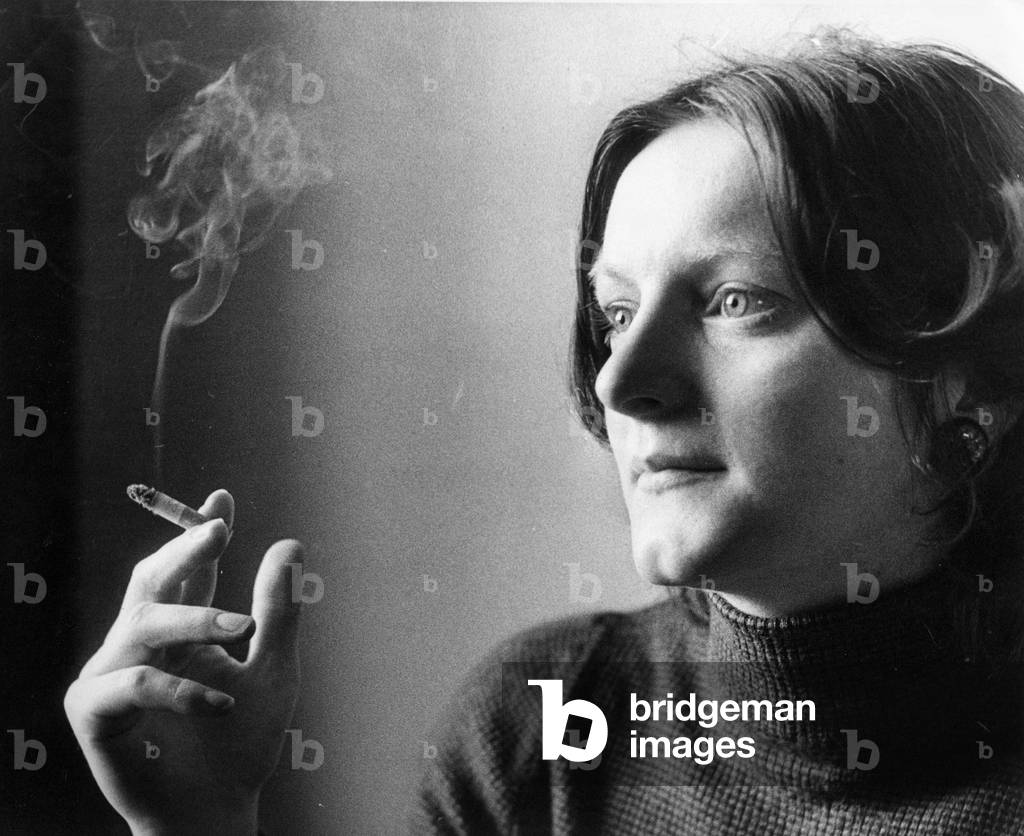 Psychology student Adrianne Little smoking a cigarette