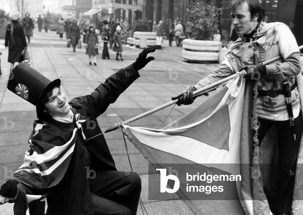 Guardian William Wallace (Gordon Walker) spears Major Block (Jim Dunsmorg) during a referendum fight in Buchanan Street Precinct, Glasgow, Scotland, 20th February 1979 (b/w photo)