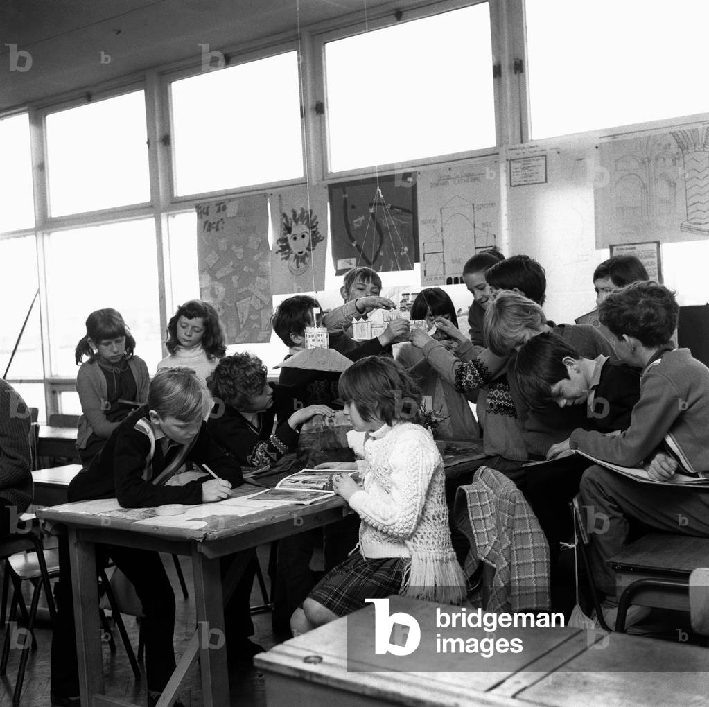 Pupils from John Street School in Jarrow, enjoying a relaxed classroom with lots reading and drawing 8 May 1971 (b/w photo)