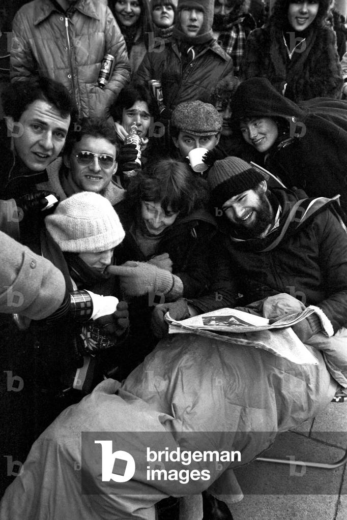 Elton John fans spent the night in sub-zero temperatures to make sure of getting tickets for the superstars concerts at Newcastle City Hall. 40 campers had taken their places on the steps in advances of Elton's March 22nd and 23rd gigs. 2nd February, 1979 (b/w photo)