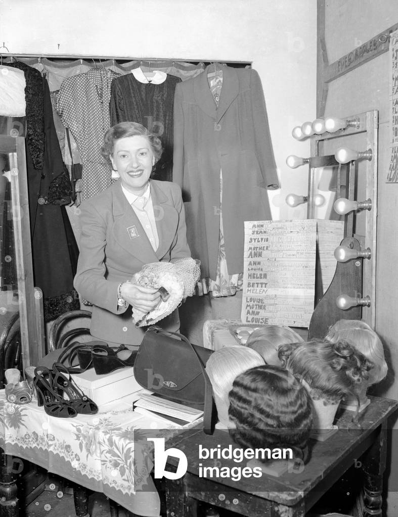 Actress Florence Desmond in the dressing room at the comedy theatre. 14th October 1952 (b/w photo)