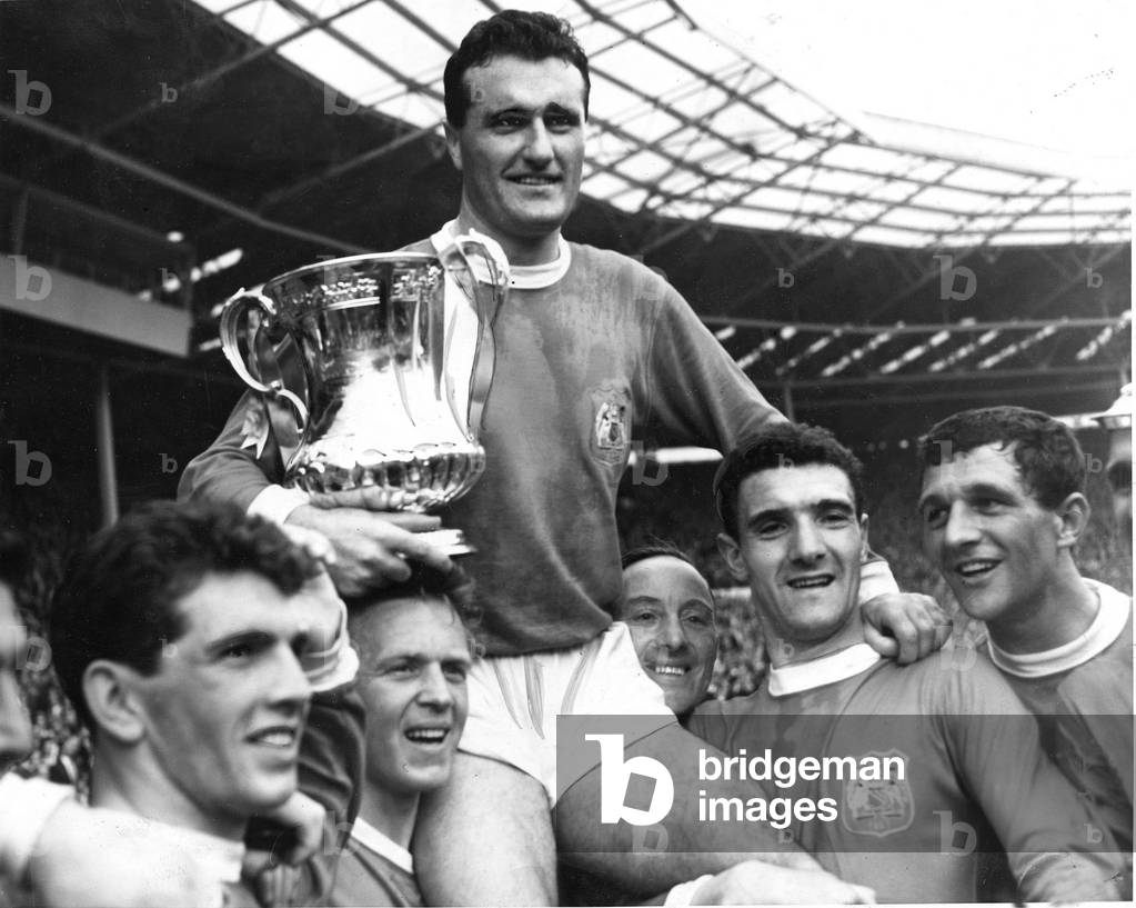 FA Cup Final at Wembley Stadium 25th May 1963Manchester United v Leicester CityNoel Cantwell, the Manchester United captain, holding the cup is chaired by his team mates during celebrations after the match (photo)