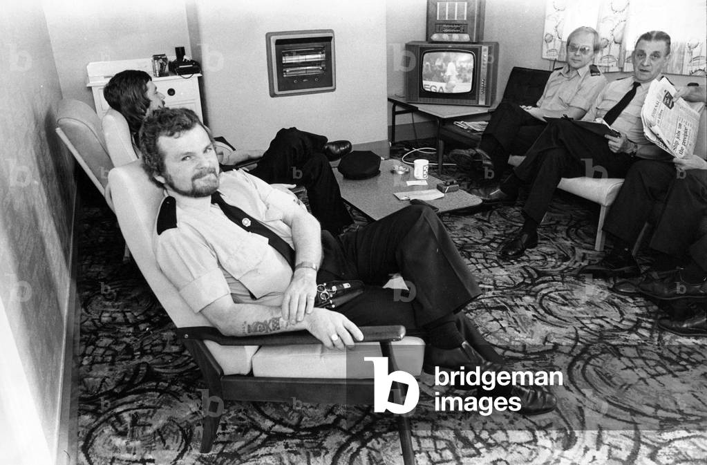 Ambulancemen relax, knowing that the next call-out could be at any moment, at Willington Quay Maternity Hospital, c.1970