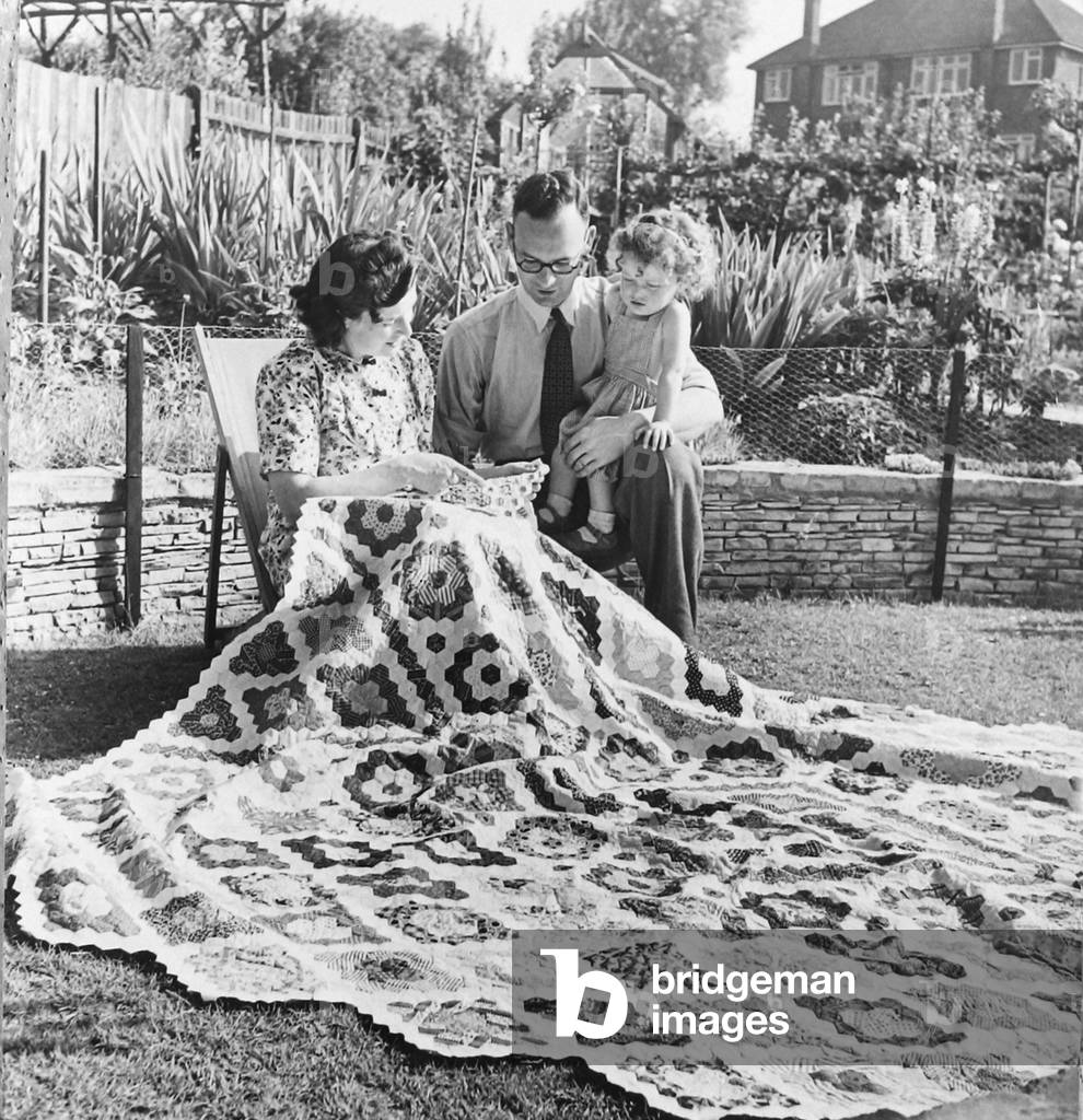 Mr & Mrs J Andrews of Eltham Patchwork quilt that has taken 100 years to make 1949 (b/w photo)