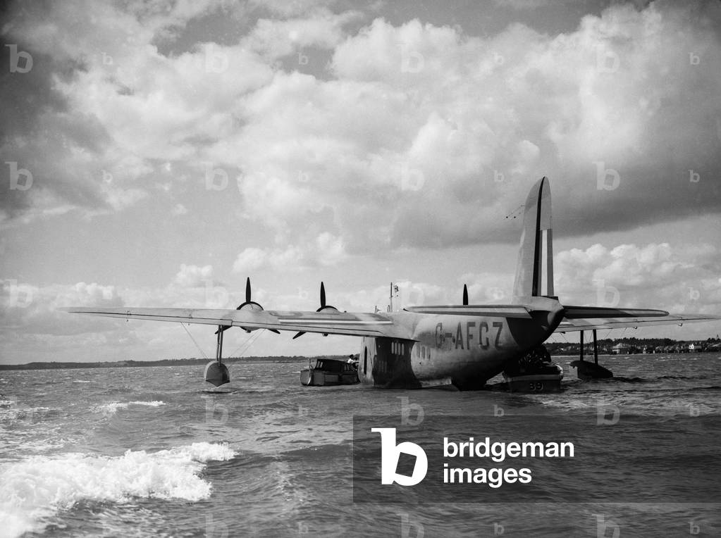 Shorts S30 Empire Flying Boat G-AFCZ named Clare owned and operated by BOAC. Seen here at Poole in Dorset following its trans-Atlantic flight, 10th August 1940 (b/w photo)