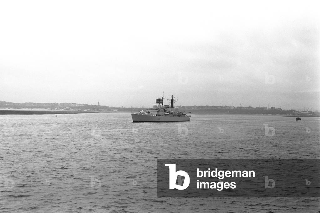 The destroyer HMS Glasgow puts to sea from the River Tyne on her way to Portsmouth to be handed over to the Royal Navy. The Swan Hunter built HMS Glasgow was the fifth Type 42 destroyer to enter service. 8th March, 1979 (b/w photo)