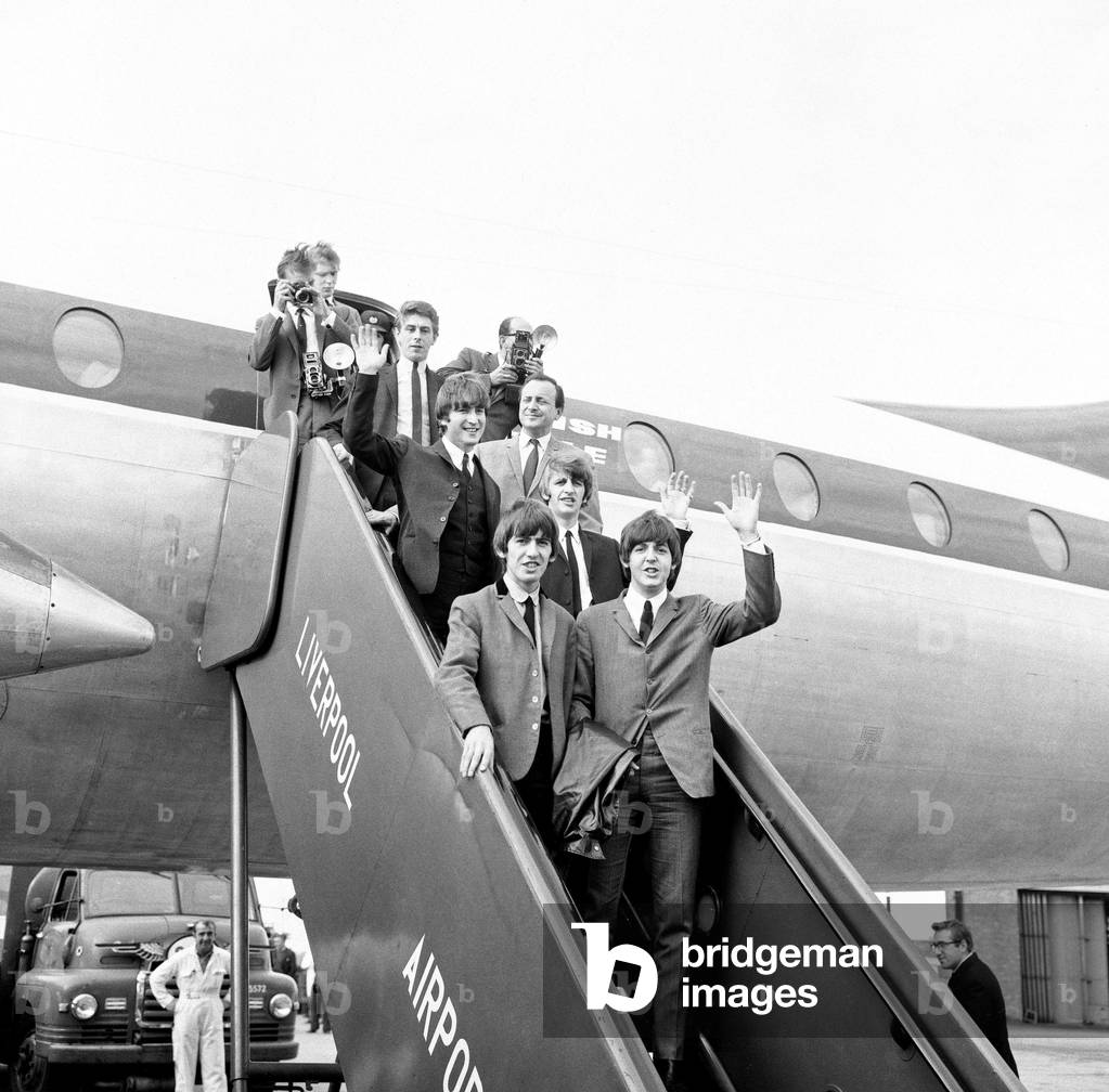 The Beatles arrive in Liverpool for the Northern Premier of A Hard Day's Night