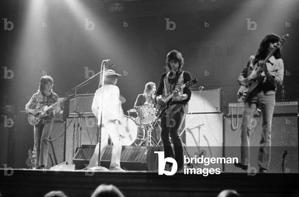 The Rolling Stones on stage of Newcastle City Hall on Thursday 4/3/1971 for the first concert of their Tour of England. March 1971 (b/w photo)