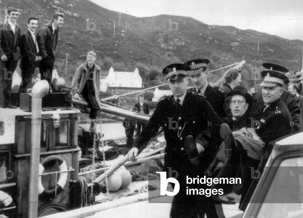 Protestors in Kyleakin on the Isle of Skye demonstrate against Sunday ferry service, which they believe is in breach of the sabbath June 1965 (b/w photo)