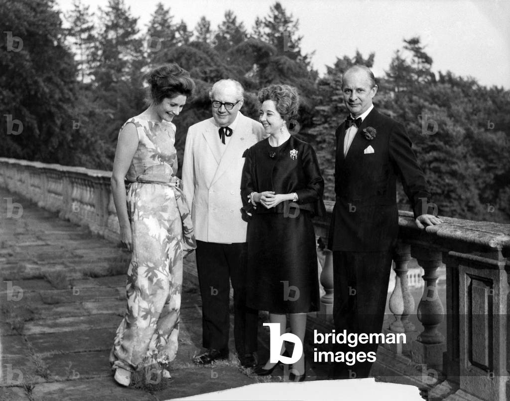 Pictures taken at Lord Astor's celebrated home, Cliveden, Buckinghamshire. Lord Astor's stately home, is surrounded by 300 acres of ground by the Thames at Taplow, Near Maidenhead. L to R Lady Astor, Signor Segovia and his wife and Lord Astor. July 1963 P017239