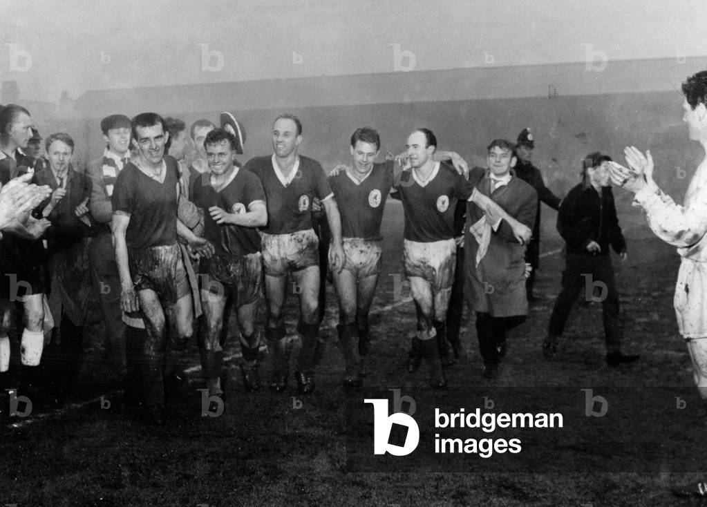 Liverpool players leave the field after beating Southampton to win the 2nd Division title. 21st April 1962 (photo)