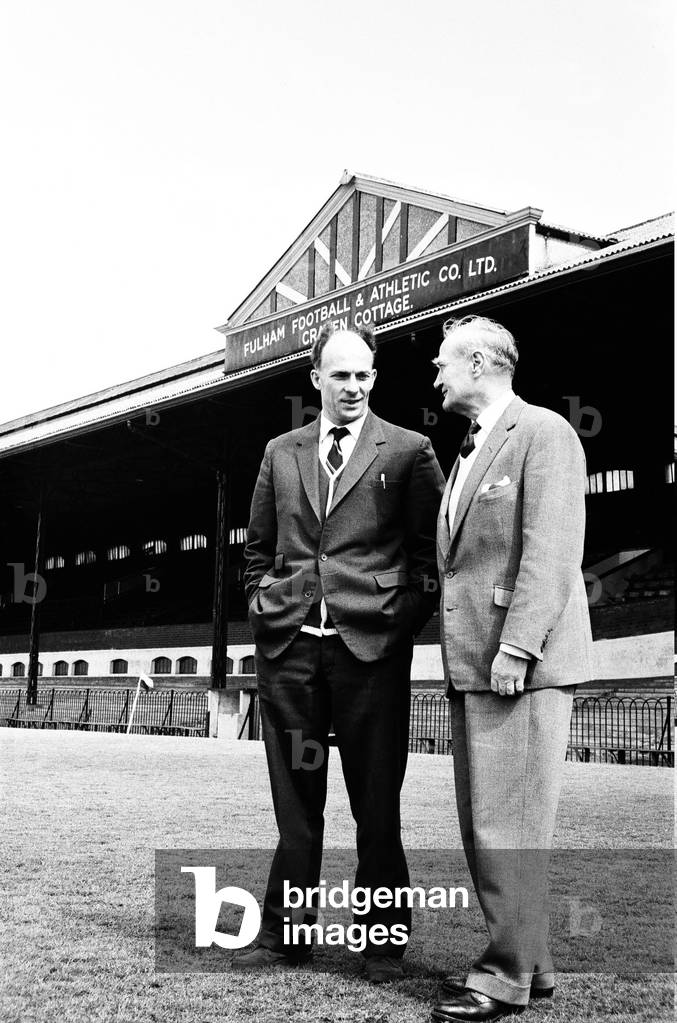 After 13 years with the club, Eddie Lowe (left) takes a look around Craven Cottage and gets some words of advice from manager Frank Osborne ahead of his last match for Fulham before he leaves to be manager at Notts County, May 4th 1963 (photo)