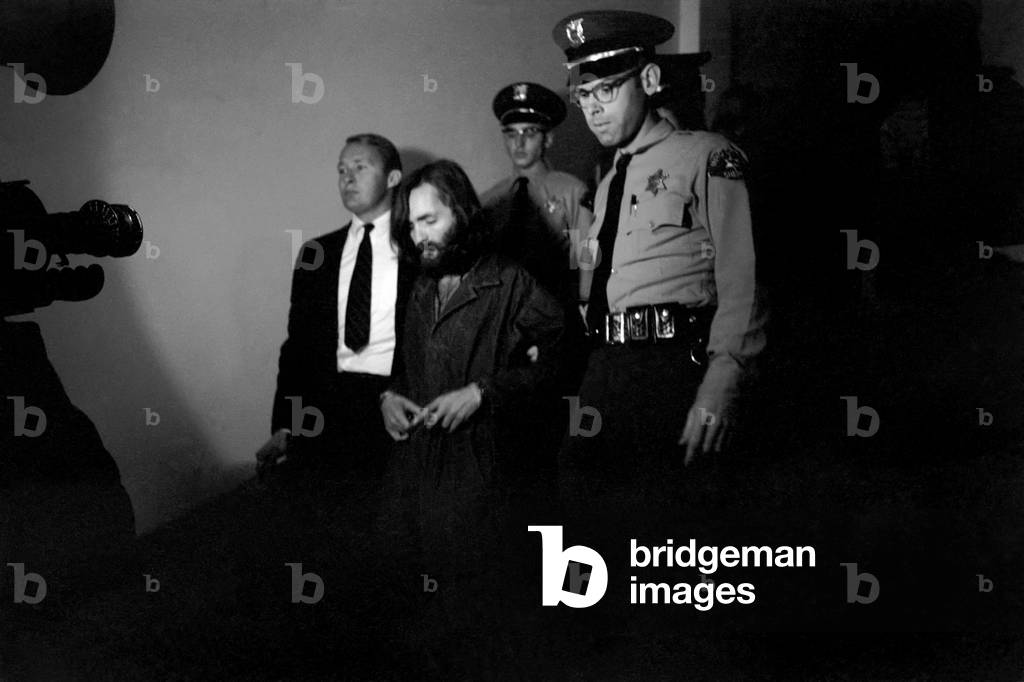 Accused murderer being led to and from court house in Inyo County, California.He is Charles Miller Manson, aged 34 years, 5th December, 1969