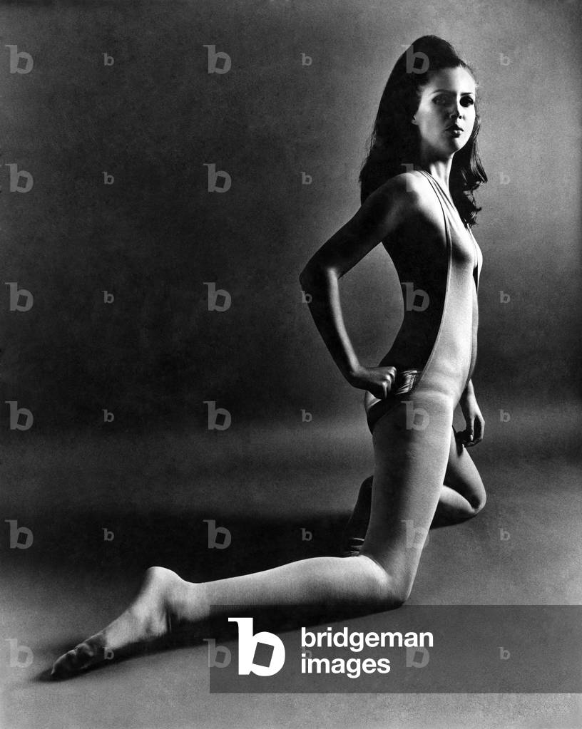 Clothing. Halter neck body stocking and gold knickers.