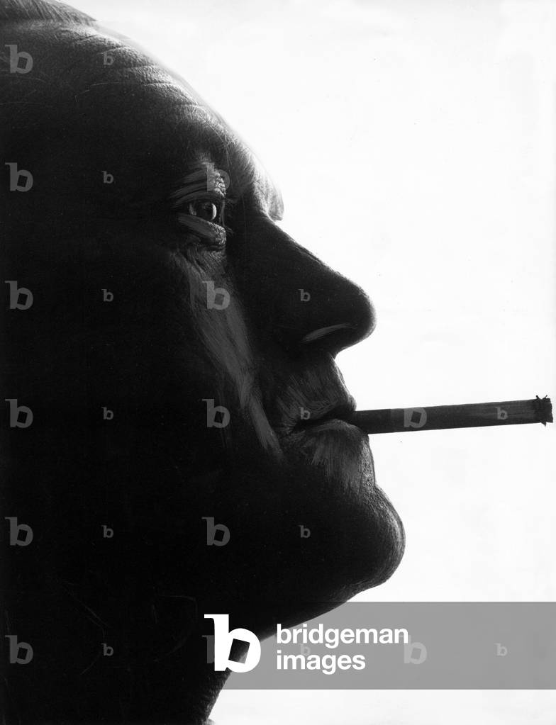 A picture of a man (Posed model) smoking