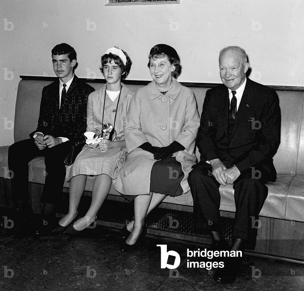General Dwight Eisenhower arriving from Paris with his wife Mamie and two grandchildren, 10th August 1962 (b/w photo)