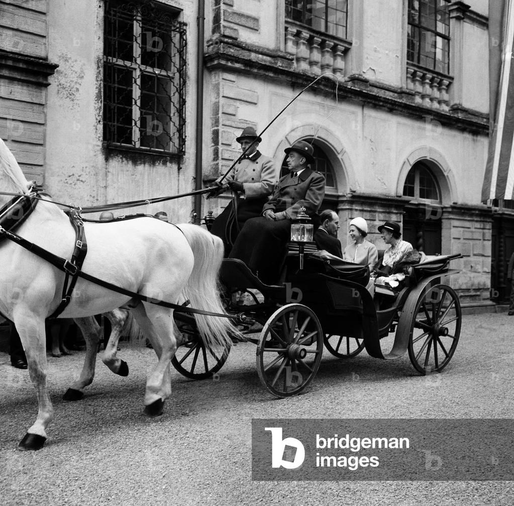 The Queen during her visit to West Germany. Pictured at Schloss Salem, she drove from the station in an open landau with Princess Margrave of Baden. 23rd May 1965 (b/w photo)