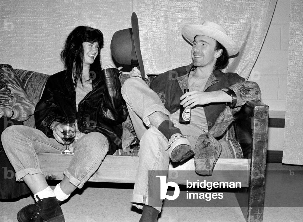 Rock group U2 in concert in USA - May 1987 The Edge enjoying a beer, 1987 (b/w photo)