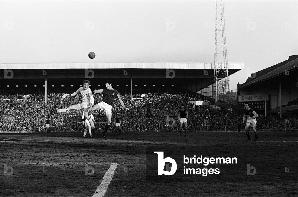 English League Division One match at Villa Park. Aston Villa 3 v Leicester City 1. Aston Villa's Dougan battles for the ball with John Sjoberg of Leicester. 15th May 1963 (photo)