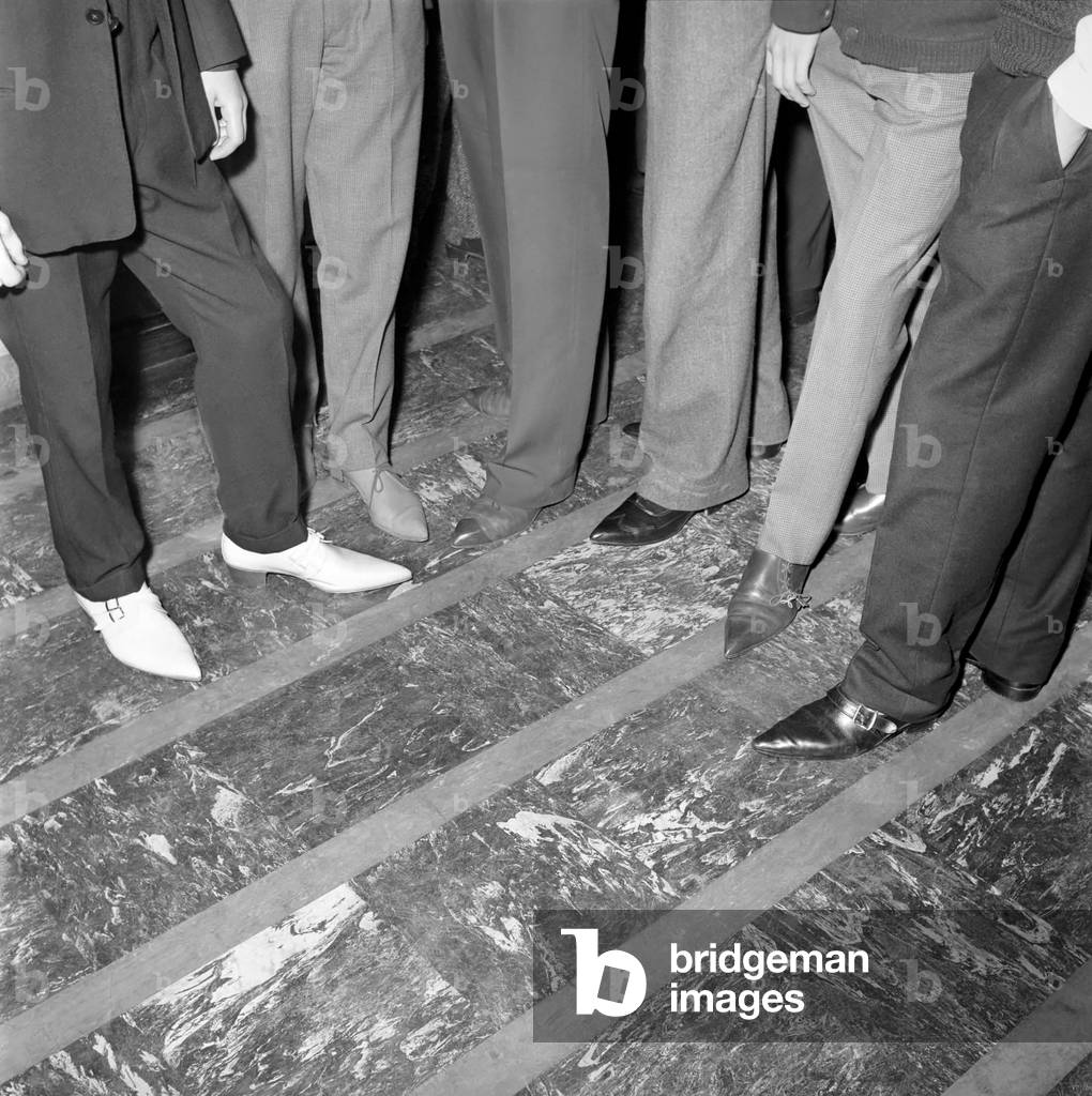 Teenager Fashions: Male Grooming: The teenage boys who go to the Ilford Palais have had to change their style of dress since the introduction of a formal dress code. October 1960 (b/w photo)