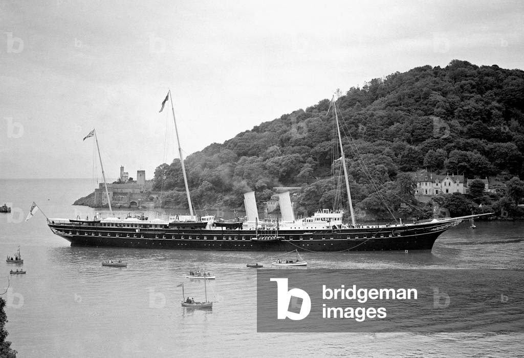 Ships Royal Yacht Victoria and Albert entering Dartmouth in Devon. She was the third yacht to carry the name Victoria and Albert, she was built at Pembroke Dock: she was 4,700 tonnes and measured 380 feet in length by 40 feet in the beam. She was used regularly up until the Second World War when it was laid up ands used as an accommodation ship in Portsmouth harbour. In 1954 she was broken up at Fraslane., 1920 (b/w photo)