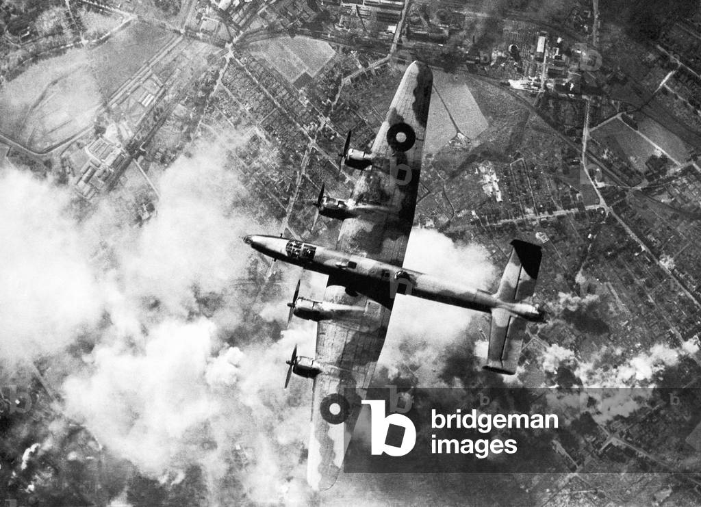 A Handley Page Halifax No 6 Group of RAF Bomber Command over the target during a daylight raid on the oil refinery at Wanne-Eickel in the Ruhr, 12 October 1944 (b/w photo)