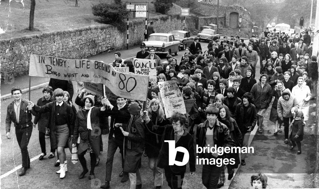 Tenby - Old - Tenby teenagers march with placards through town in protest over the lack of entertainment facilities in the town - 13th April 1966 -
