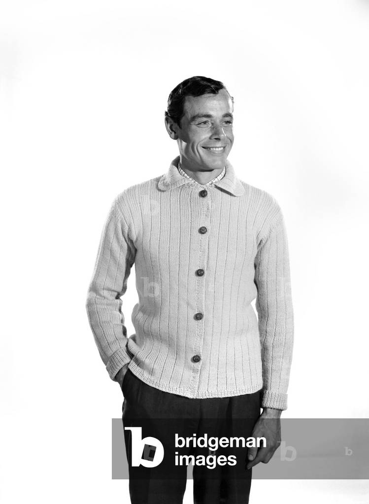 Model John Handy wearing cardigan in Reveille Studio . 1960