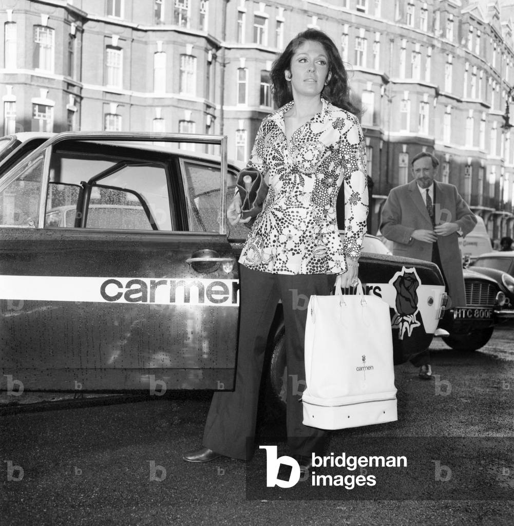 Diana Margulies of Bedfordshire and her glamour car, pictured at Carmen House today. November 1969