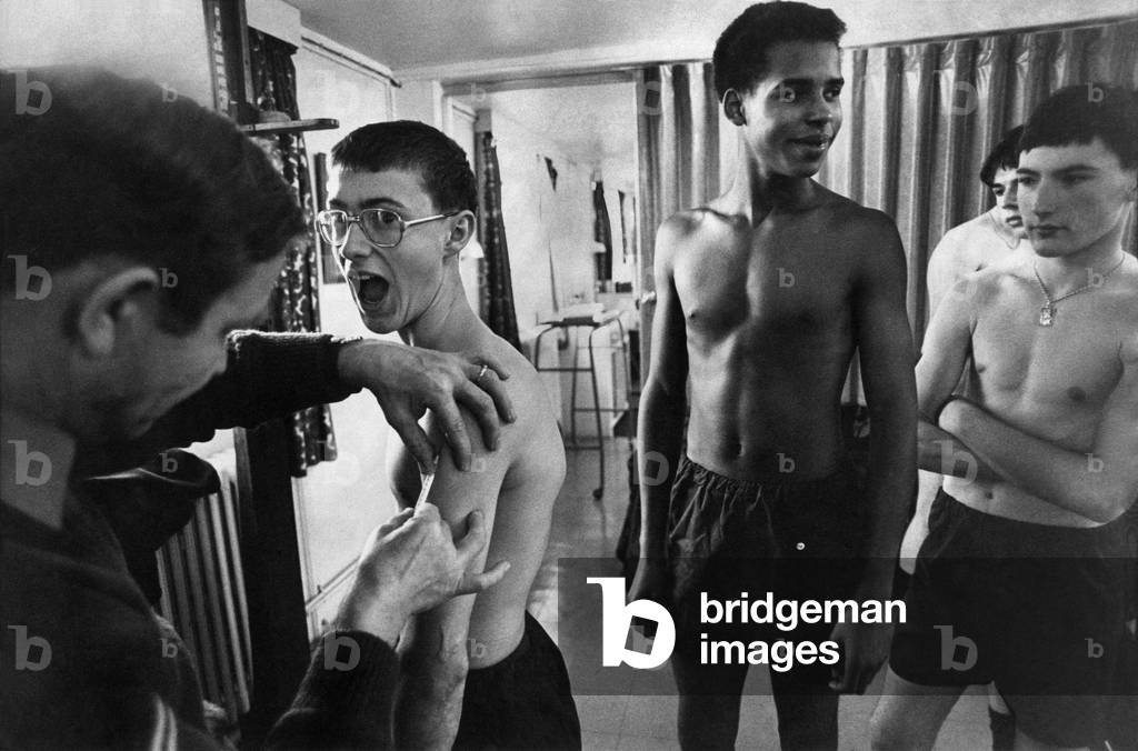 Young Army soldiers receive their medication in the form of injections, March 1979