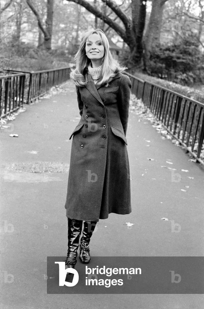 Fashion Clothing. Woman Model: Blanche Webb wearing the 'midi' coat. November 1969