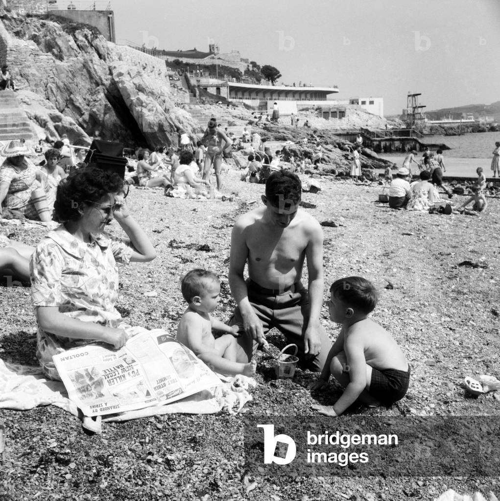 Families on the beach at Plymouth: