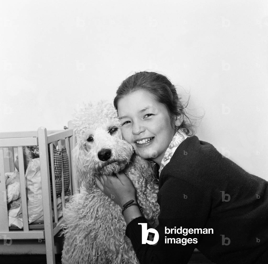 Child star Mandy Miller is pictured here at home on 8th May 1955 (b/w photo)