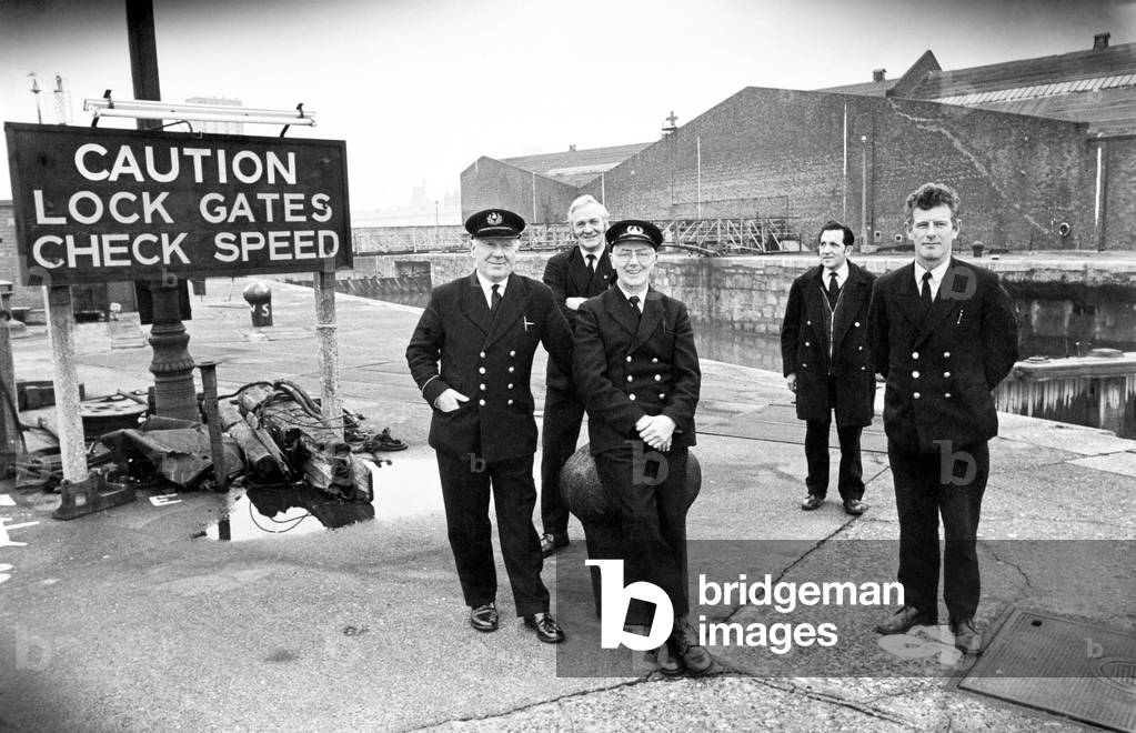 The last watch at the Brunswick Dock, (left to right), acting dockmaster Alec Broadbent, gatemen Bob Bennett, Cyril Vine, Charles Goldson and Geoff Dawson. 3rd January 1975 (b/w photo)