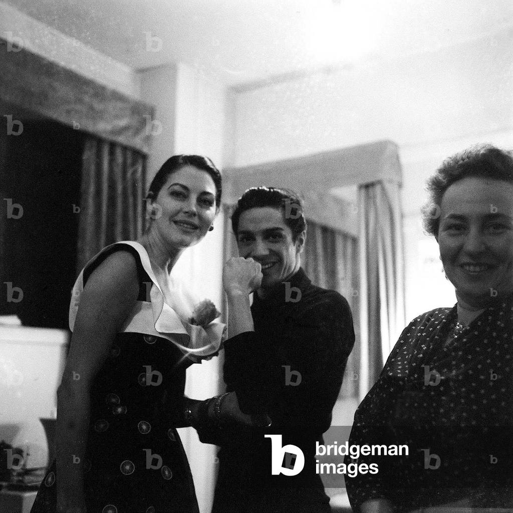 Ava Gardner with Antonio the Spanish dancer, July 1955 (b/w photo)