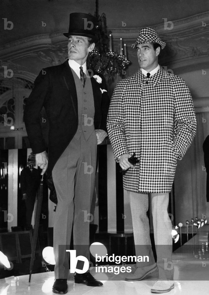 Left morning coat in black lambs wool with tan gaberdine waist-coat and trousers. Right raglan Mini-coat in Black/White hounds-tooth check tweed, September 1965
