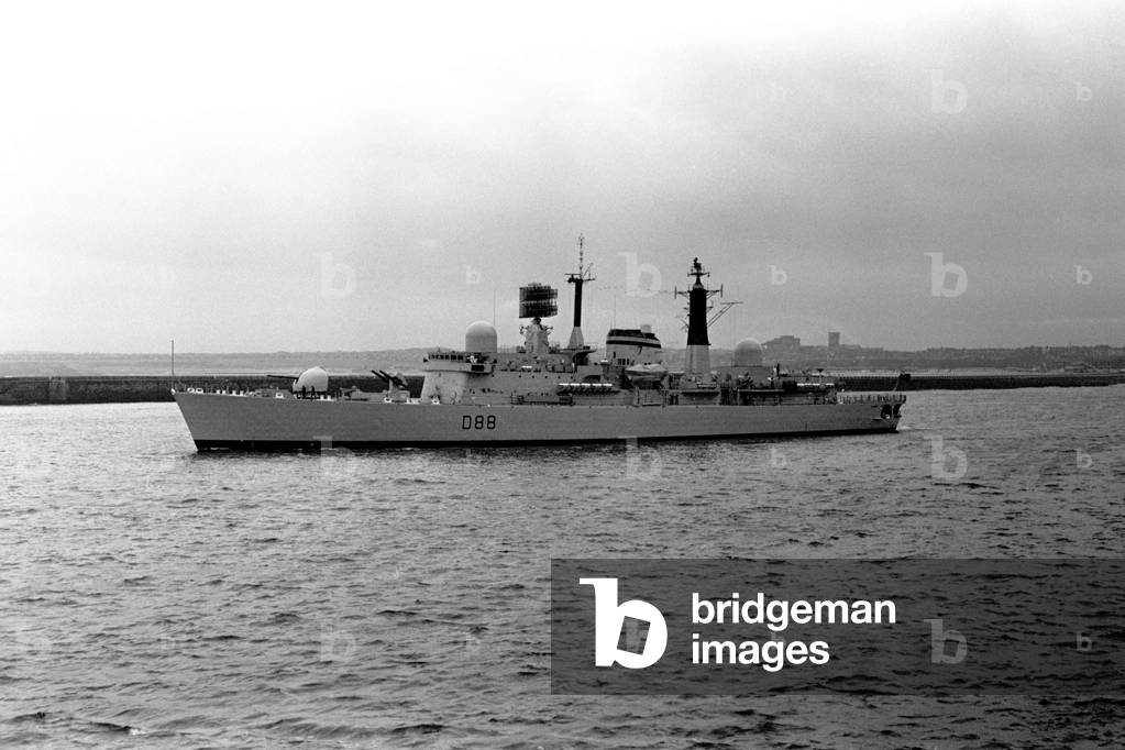 The destroyer HMS Glasgow puts to sea from the River Tyne on her way to Portsmouth to be handed over to the Royal Navy. The Swan Hunter built HMS Glasgow was the fifth Type 42 destroyer to enter service. 8th March, 1979 (b/w photo)
