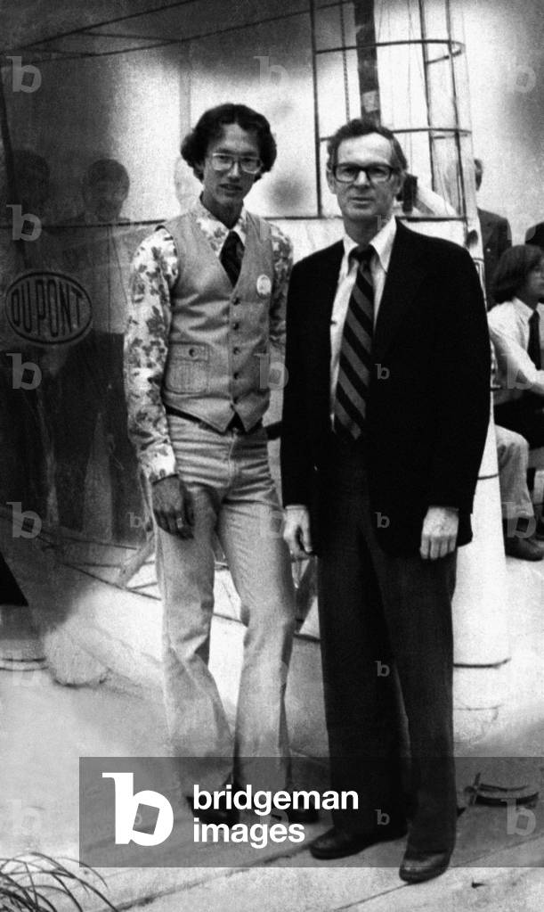 The Gossamer Albatross human-powered aircraft built by American aeronautical engineer Dr Paul B MacCready (right). On June 12, 1979 it completed the first successful human-powered aircraft crossing of the English Channel to win the second Kremer prize of £100,000. Bryan Allen, 26, (left) pedalled and piloted the aircraft across the channel. The two men are seen here at the American Embassy in London with the plane. Circa : June 1979 (b/w photo)