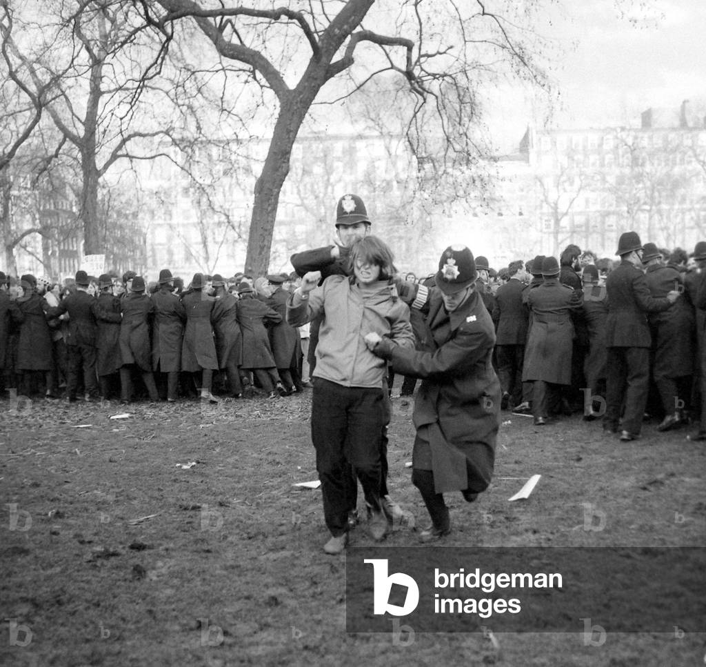 A demonstrator is led away during riots at US Embassy, Grosvenor Square, over the on-going Vietnam Conflict.
March 1968
